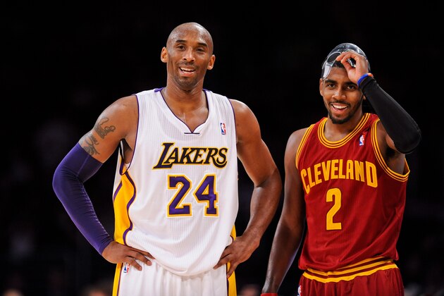 LOS ANGELES, CA - JANUARY 13: Kobe Bryant #24 of the Los Angeles Lakers and Kyrie Irving #2 of the Cleveland Cavaliers share a laugh during their game at Staples Center on January 13, 2013 in Los Angeles, California. NOTE TO USER: User expressly acknowledges and agrees that, by downloading and/or using this Photograph, user is consenting to the terms and conditions of the Getty Images License Agreement. Mandatory Copyright Notice: Copyright 2013 NBAE (Photo by Noah Graham/NBAE via Getty Images)