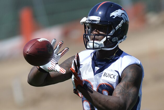 Denver Broncos' Demaryius Thomas catches a pass during an NFL football organized team activity, Monday, June 2, 2014, in Englewood, Colo. (AP Photo/Jack Dempsey)