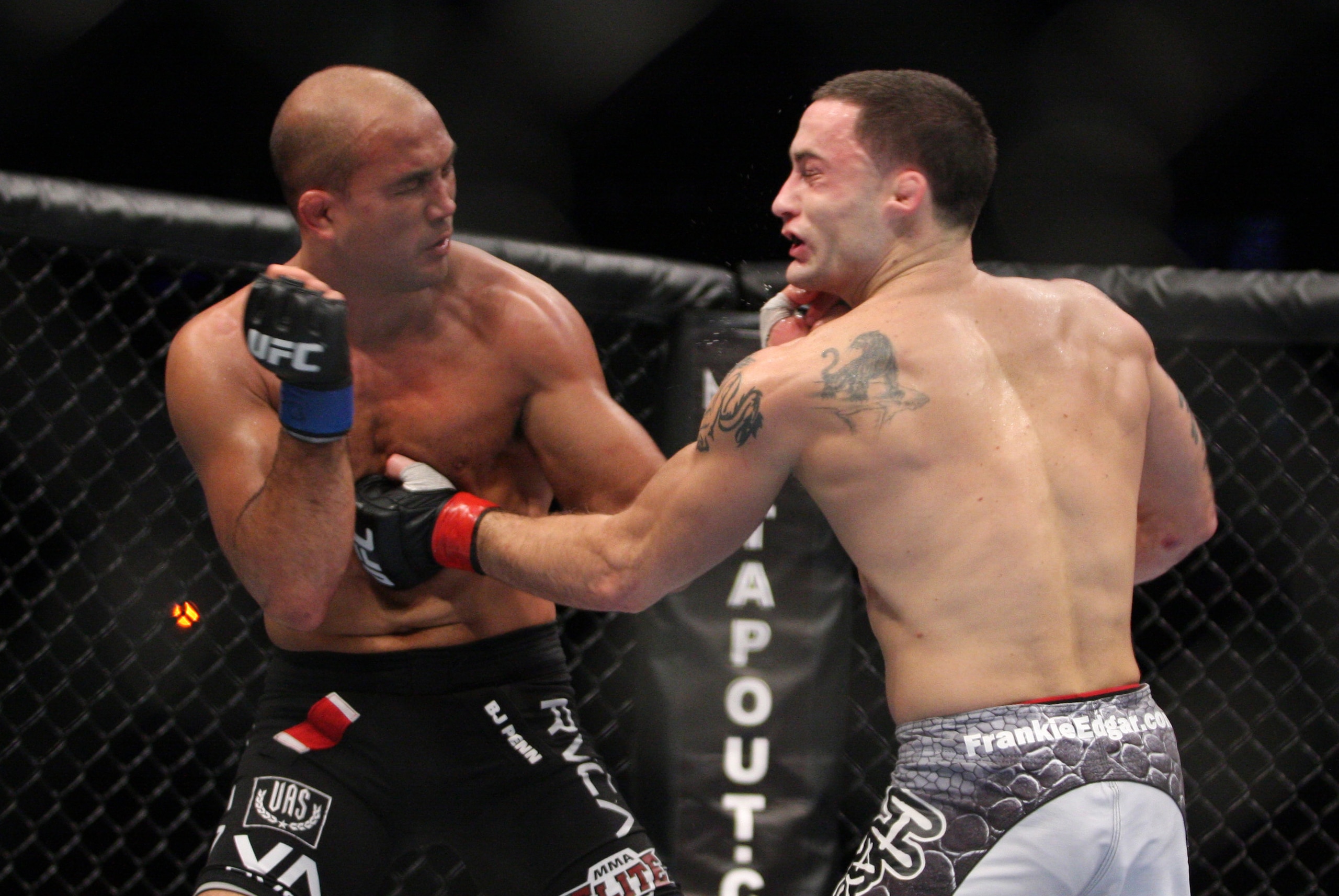 Frankie Edgar, right, in action against BJ Penn during their UFC fight at the TD Garden on Saturday, August 28, 2010 in Boston, MA. Edgar retained his UFC lightweight title via unanimous decision. (AP Photo/Gregory Payan)