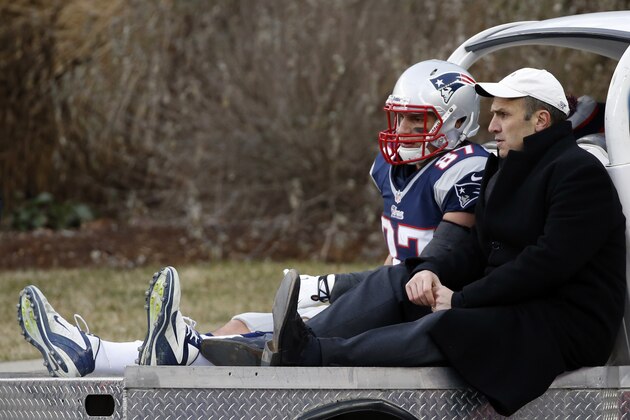 New England Patriots tight end Rob Gronkowski leaves the field in a cart after being injured in the third quarter of an NFL football game against the Cleveland Browns Sunday, Dec. 8, 2013, in Foxborough, Mass. (AP Photo/Elise Amendola)