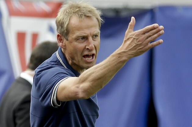 United States head coach Jurgen Klinsmann yells out to players during the first half of an international friendly soccer match between the United States and Nigeria in Jacksonville, Fla., Saturday, June 7, 2014. (AP Photo/John Raoux)