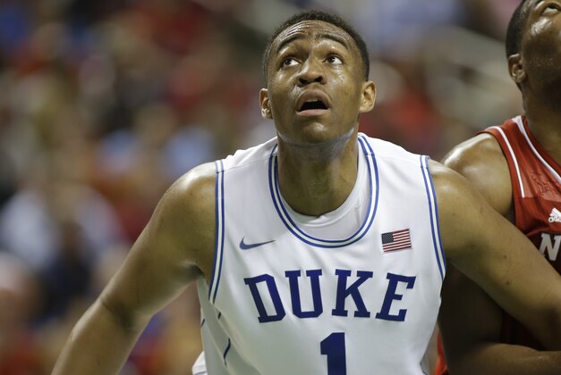 Duke's Jabari Parker (1) looks up for a rebound against North Carolina State during the first half of an NCAA college basketball game in the semifinals of the Atlantic Coast Conference tournament in Greensboro, N.C., Saturday, March 15, 2014. (AP Photo/Bob Leverone)