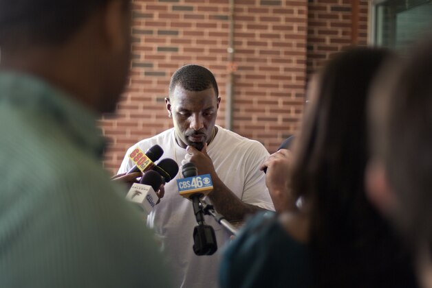 Atlanta Falcons' William Moore talks to reporters following an NFL football organized team activity, Wednesday, June 4, 2014, in Flowery Branch, Ga. (AP Photo/David Goldman)