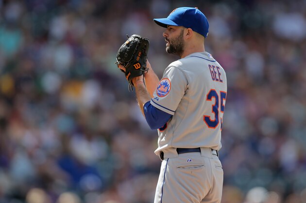 DENVER, CO - MAY 04:  Starting pitcher Dillon Gee #35 of the New York Mets delivers against the Colorado Rockies at Coors Field on May 4, 2014 in Denver, Colorado. Gee earned the win as the Mets defeated the Rockies 5-1.  (Photo by Doug Pensinger/Getty Images)