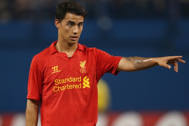 TORONTO, CANADA - JULY 21: Suso #30 of Liverpool motions during their match against Toronto FC during the World Football Challenge friendly match on July 21, 2012 at Rogers Centre in Toronto, Ontario, Canada. (Photo by Tom Szczerbowski/Getty Images)
