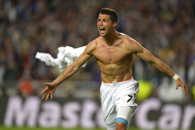 Real's Cristiano Ronaldo, gestures, at the end of the Champions League final soccer match between Atletico Madrid and Real Madrid, at the Luz stadium, in Lisbon, Portugal, in Lisbon, Portugal, Saturday, May 24, 2014. (AP Photo/Manu Fernandez) Real's Cristiano Ronaldo, gestures, at the end of the Champions League final soccer match between Atletico Madrid and Real Madrid, at the Luz stadium, in Lisbon, Portugal, in Lisbon, Portugal, Saturday, May 24, 2014. (AP Photo/Manu Fernandez)