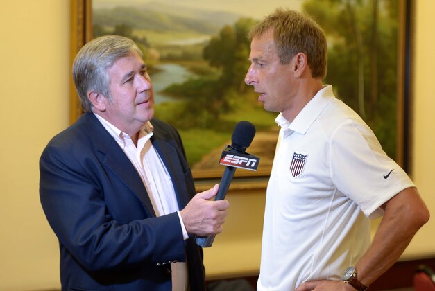 Sep 5, 2013; San Jose, COSTA RICA; ESPN reporter Boby Ley (left) interviews United States coach Jurgen Klinsmann at a press conference at the Costa Rica Marriott San Jose in advance of the FIFA World Cup Qualifier against Costa Rica. Mandatory Credit: Kirby Lee-USA TODAY Sports
