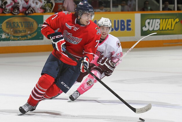 PETERBOROUGH, ON - FEBRUARY 6:  Michael Dal Colle #71 of the Oshawa Generals skates with the puck against the Peterborough Petes during an OHL game at the Peterborough Memorial Centre on February 6, 2014 in Peterborough, Ontario, Canada. The Petes defeated the Generals 4-3 in a overtime shoot-out. (Photo by Claus Andersen/Getty Images)