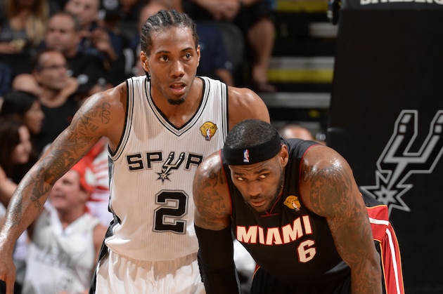 SAN ANTONIO, TX - JUNE 08: Kawhi Leonard #2 of the San Antonio Spurs and LeBron James #6 of the Miami Heat during Game Two of the 2014 NBA Finals between the Miami Heat and San Antonio Spurs at AT&T Center on June 8, 2014 in San Antonio, Texas. NOTE TO USER: User expressly acknowledges and agrees that, by downloading and/or using this photograph, user is consenting to the terms and conditions of the Getty Images License Agreement.  Mandatory Copyright Notice: Copyright 2014 NBAE (Photo by Andrew D Bernstein/NBAE via Getty Images)
