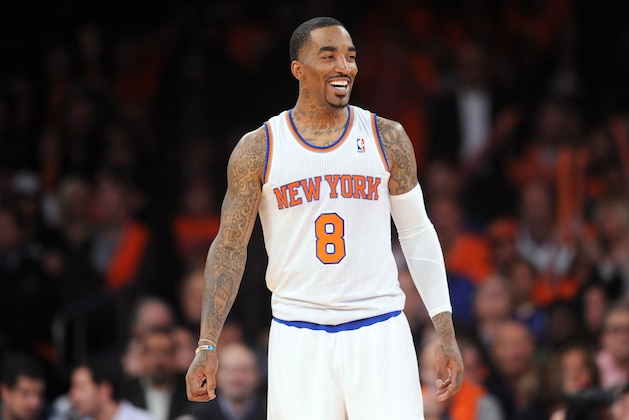 Apr 2, 2014; New York, NY, USA; New York Knicks guard J.R. Smith (8) looks on against the Brooklyn Nets during the second half at Madison Square Garden. The New York Knicks won 110-81. Mandatory Credit: Joe Camporeale-USA TODAY Sports