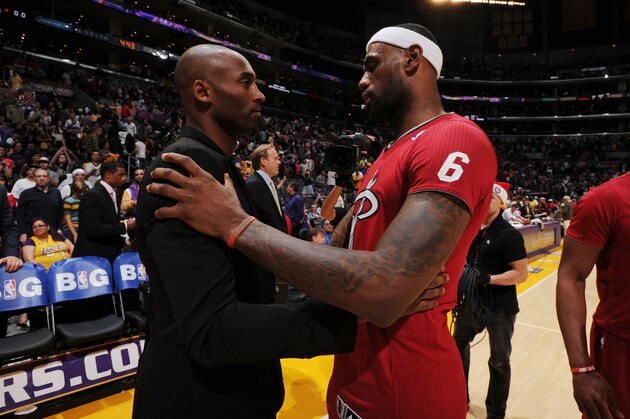 LOS ANGELES, CA - DECEMBER 25: Kobe Bryant #24 of the Los Angeles Lakers and LeBron James #6 of the Miami Heat converse after a game at STAPLES Center on December 25, 2013 in Los Angeles, California. NOTE TO USER: User expressly acknowledges and agrees that, by downloading and/or using this Photograph, user is consenting to the terms and conditions of the Getty Images License Agreement. Mandatory Copyright Notice: Copyright 2013 NBAE (Photo by Andrew D. Bernstein/NBAE via Getty Images)