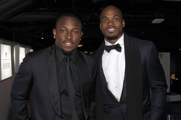 LeSean McCoy of the Philadelphia Eagles, left, and Adrian Peterson of the Minnesota Vikings pose backstage at the 3rd annual NFL Honors at Radio City Music Hall on Saturday, Feb. 1, 2014, in New York. (Photo by Mark Von Holden/Invision for NFL/AP Images)