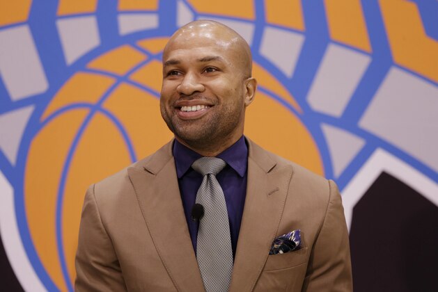 Derek Fisher participates in a news conference in Tarrytown, N.Y., Tuesday, June 10, 2014. The New York Knicks hired Fisher as their new coach on Tuesday, with Phil Jackson turning to one of his trustiest former players. (AP Photo/Seth Wenig)