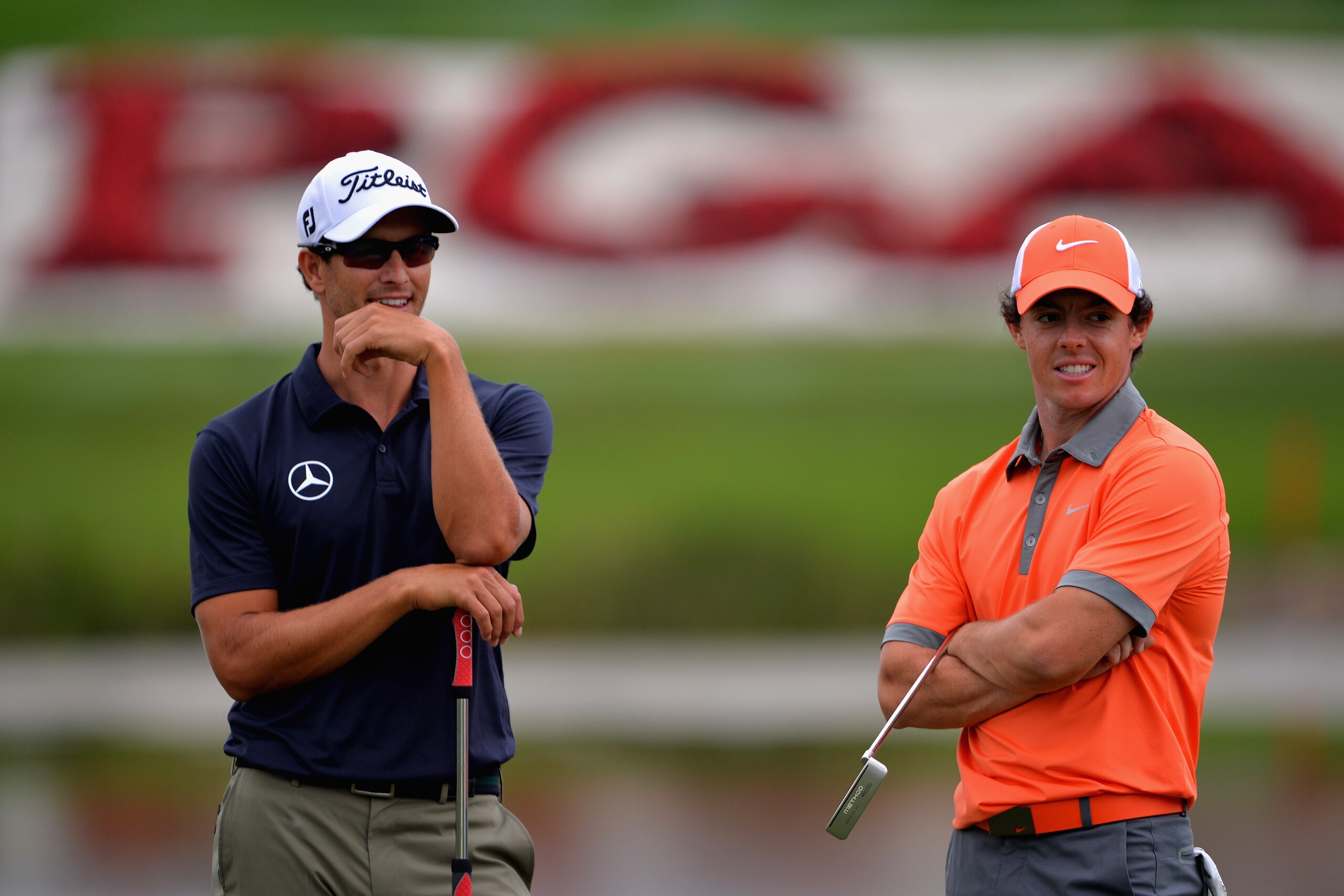 PALM BEACH GARDENS, FL - FEBRUARY 27:  Rory McIlroy of Northern Ireland (R) and Adam Scott of Australia talk to one another during the first round of The Honda Classic at PGA National Resort and Spa on February 27, 2014 in Palm Beach Gardens, Florida.  (Photo by Stuart Franklin/Getty Images)