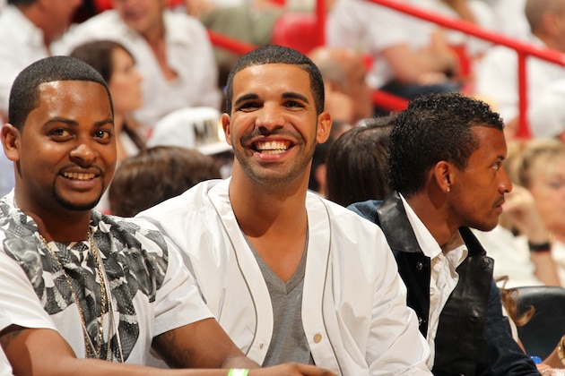 MIAMI, FL - JUNE 20:  Rapper Drake smiles as he watches Game Seven of the 2013 NBA Finals between the San Antonio Spurs and the Miami Heat on June 20, 2013 at American Airlines Arena in Miami, Florida. NOTE TO USER: User expressly acknowledges and agrees that, by downloading and or using this photograph, User is consenting to the terms and conditions of the Getty Images License Agreement. Mandatory Copyright Notice: Copyright 2013 NBAE (Photo by Issac Baldizon/NBAE via Getty Images)