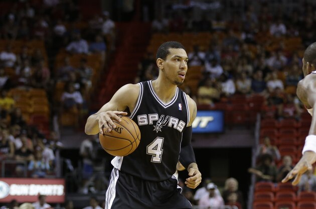 San Antonio Spurs' Danny Green (4) looks to pass as Miami Heat's James Jones (22) defends during the first half of an NBA preseason basketball game, Saturday, Oct. 19, 2013, in Miami. (AP Photo/Lynne Sladky) San Antonio Spurs' Danny Green (4) looks to pass as Miami Heat's James Jones (22) defends during the first half of an NBA preseason basketball game, Saturday, Oct. 19, 2013, in Miami. (AP Photo/Lynne Sladky)