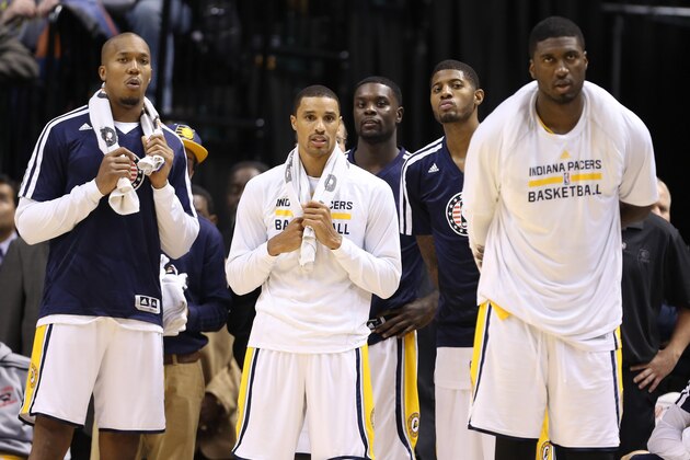 Nov 11, 2013; Indianapolis, IN, USA; Indiana Pacers from left to right forward David West, guard George Hill, guard Lance Stephenson, forward Paul George, and center Roy Hibbert watch the Pacers extend their winning streak to 8-0 against the Memphis Grizzlies at Bankers Life Fieldhouse. Indiana defeats Memphis 95-79. Mandatory Credit: Brian Spurlock-USA TODAY Sports