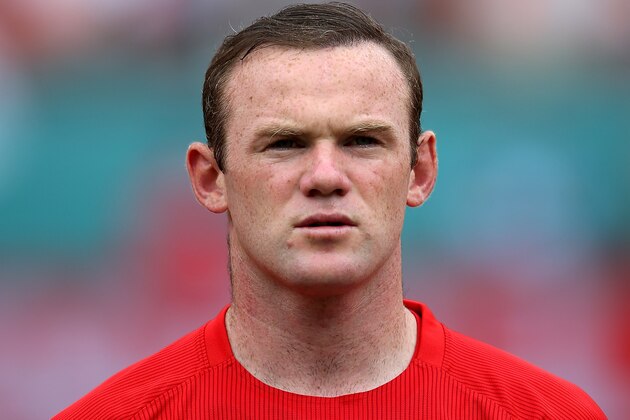 MIAMI GARDENS, FL - JUNE 04:  Wayne Rooney lines up for the national anthems during the International friendly match between England and Ecuador at Sun Life Stadium on June 4, 2014 in Miami Gardens, Florida.  (Photo by Richard Heathcote/Getty Images)