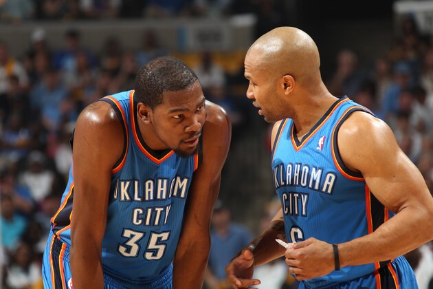 MEMPHIS, TN - MAY 11: Derek Fisher #6 of the Oklahoma City Thunder shares a word with teammate Kevin Durant #35 in Game Three of the Western Conference Semifinals against the Memphis Grizzlies during the 2013 NBA Playoffs on May 11, 2013 at FedExForum in Memphis, Tennessee. NOTE TO USER: User expressly acknowledges and agrees that, by downloading and or using this photograph, User is consenting to the terms and conditions of the Getty Images License Agreement. Mandatory Copyright Notice: Copyright 2013 NBAE (Photo by Joe Murphy/NBAE via Getty Images)