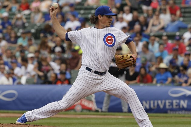 Chicago Cubs starter Jeff Samardzija throws against the Miami Marlins during the first inning of a baseball game in Chicago, Saturday, June 7, 2014. (AP Photo/Nam Y. Huh)