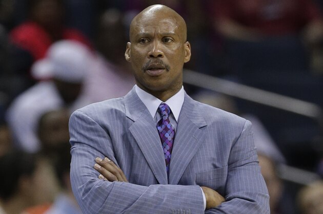 In this Wednesday, April 17, 2013 file photo, Cleveland Cavaliers head coach Byron Scott looking on during the first half of an NBA basketball game against the Charlotte Bobcats in Charlotte, N.C. The Cleveland Cavaliers have fired coach Byron Scott after three losing seasons. (AP Photo/Chuck Burton, File)