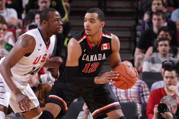 PORTLAND, OR - APRIL 12:  Trey Lyles #12 of the World Team drives to the basket against Team USA on April 12, 2014 at the Moda Center Arena in Portland, Oregon. NOTE TO USER: User expressly acknowledges and agrees that, by downloading and or using this photograph, user is consenting to the terms and conditions of the Getty Images License Agreement. Mandatory Copyright Notice: Copyright 2014 NBAE (Photo by Sam Forencich/NBAE via Getty Images)