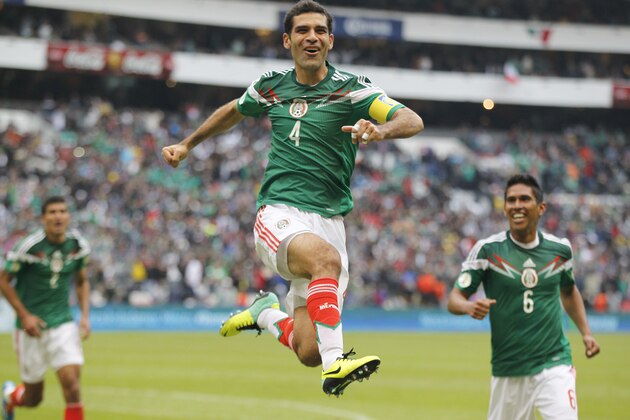 FILE - In this Nov. 13, 2013, file photo, Mexico's Rafael Marquez celebrates after scoring his team's 5th goal during a 2014 World Cup playoff first round match against New Zealand in Mexico City. (AP Photo/Eduardo Verdugo,File) - SEE FURTHER WORLD CUP CONTENT AT APIMAGES.COM