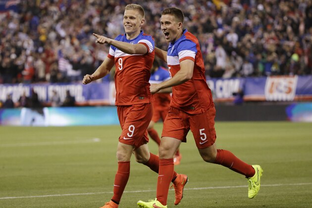 United States' Aron Johannsson (9) celebrates his goal with teammate Matt Besler, right, during the second half of an international friendly soccer match against Azerbaijan on Tuesday, May 27, 2014, in San Francisco. United States won 2-0. (AP Photo/Marcio Jose Sanchez)