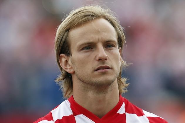 Croatia's Ivan Rakitic listens to the national anthem ahead of the international soccer friendly match between Croatia and Mali, in Osijek, Croatia, Saturday, May 31, 2014. (AP Photo/Darko Bandic)