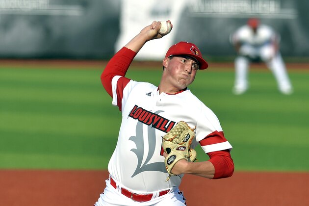 Louisville's Kyle Funkhouser pitches to a Kennesaw State batter in the second inning of an NCAA college baseball tournament super regional game in Louisville, Ky., Friday, June 6, 2014. (AP Photo/Timothy D. Easley)
