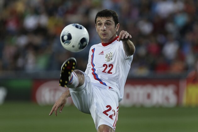 Russia's Alan Dzagoev controls the ball during a European U21 Soccer Championship Group A match against Netherlands in Jerusalem, Sunday, June 9, 2013. (AP Photo/Bernat Armangue)