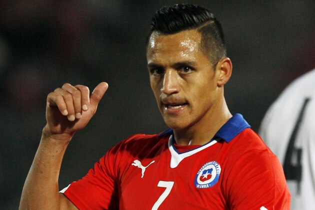 Chile's Alexis Sanchez on the pitch during a friendly match against Egypt in Santiago, Chile, Friday, May 30, 2014. (AP Photo/Luis Hidalgo)