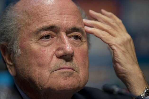 FIFA President Sepp Blatter looks on during a press conference where he talked about the organization and infrastructure of the upcoming World Cup, in Sao Paulo, Brazil, Thursday, June 5, 2014. The World Cup soccer tournament starts on 12 June. (AP Photo/Andre Penner)