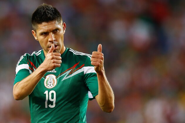 FOXBORO, MA - JUNE 06: Oribe Peralta #19 of Mexico reacts to a teammate during a corner kick against Portugal in the second half during the international friendly match at Gillette Stadium on June 6, 2014 in Foxboro, Massachusetts.  (Photo by Jared Wickerham/Getty Images)
