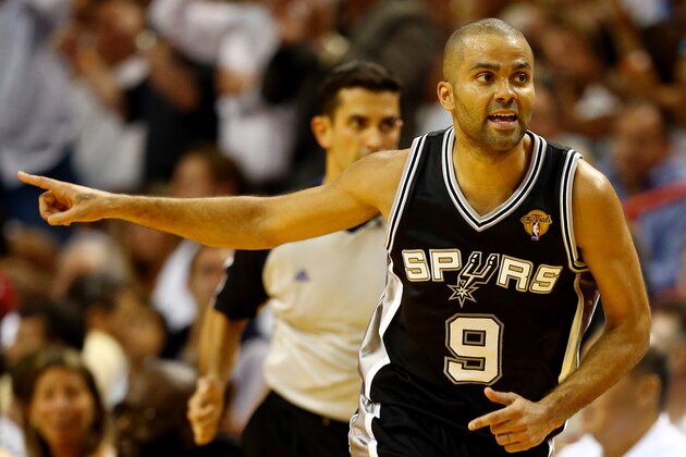 MIAMI, FL - JUNE 10: Tony Parker #9 of the San Antonio Spurs reacts against the Miami Heat during Game Three of the 2014 NBA Finals at American Airlines Arena on June 10, 2014 in Miami, Florida. NOTE TO USER: User expressly acknowledges and agrees that, by downloading and or using this photograph, User is consenting to the terms and conditions of the Getty Images License Agreement.  (Photo by Andy Lyons/Getty Images)