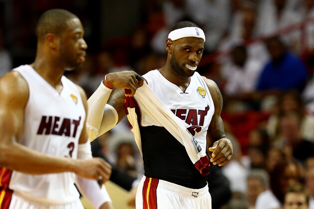 MIAMI, FL - JUNE 10:  LeBron James #6 of the Miami Heat walks to the bench during Game Three of the 2014 NBA Finals against the San Antonio Spurs at American Airlines Arena on June 10, 2014 in Miami, Florida. NOTE TO USER: User expressly acknowledges and agrees that, by downloading and or using this photograph, User is consenting to the terms and conditions of the Getty Images License Agreement.  (Photo by Andy Lyons/Getty Images)