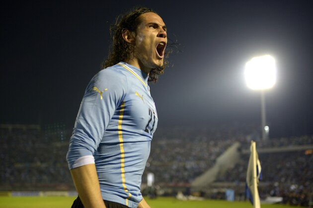 Uruguay's Edinson Cavani celebrates after scoring against  Slovenia during a friendly soccer match in Montevideo, Uruguay, Wednesday, June 4, 2014. (AP Photo/Matilde Campodonico)