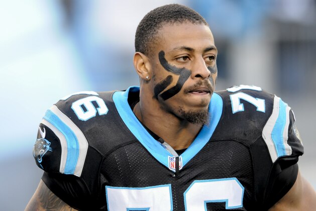 Carolina Panthers defensive end Greg Hardy (76) runs on the the field during player introductions before the start of an NFL football game  in Charlotte, NC, Sunday, Dec. 15, 2013. (AP Photo / Mike McCarn)
