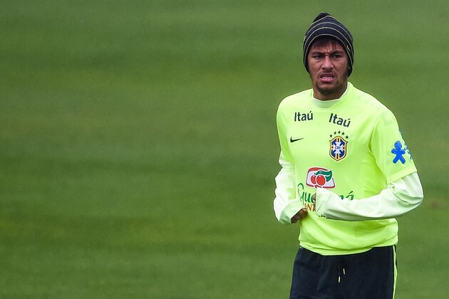 TERESOPOLIS, BRAZIL - JUNE 10: Neymar in action during a training session of the Brazilian national football team at the squad's Granja Comary training complex, on June 10, 2014 in Teresopolis, 90 km from downtown Rio de Janeiro, Brazil. (Photo by Buda Mendes/Getty Images)