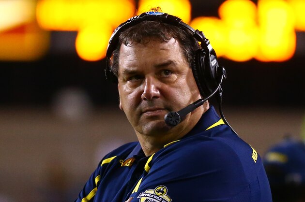 Dec 28, 2013; Tempe, AZ, USA; Michigan Wolverines head coach Brady Hoke in the second half against the Kansas State Wildcats during the Buffalo Wild Wings Bowl at Sun Devil Stadium. Kansas State defeated Michigan 31-14. Mandatory Credit: Mark J. Rebilas-USA TODAY Sports