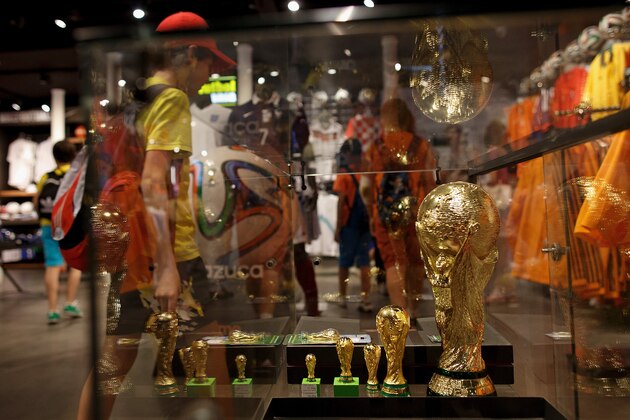 MADRID, SPAIN - JUNE 10:  Replicas of the World Cup trophy are displayed in a store on June 10, 2014 in Madrid, Spain. Current champion Spain will play their first match of the FIFA World cup against Netherlands in Salvador de Bahia, Brazil on June 13, 2014.  (Photo by Pablo Blazquez Dominguez/Getty Images)