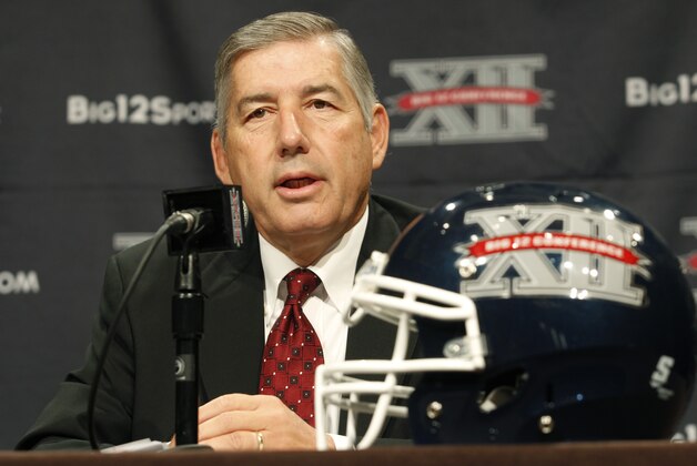 ADVANCE FOR WEEKEND EDITIONS, JUNE 7-8 - FILE - In this July 22, 2013, file photo, Big 12 Conference Commissioner Bob Bowlsby addresses the media at the beginning of the Big 12 Conference Football Media Days in Dallas. The NCAA is in the midst of a radical restructuring that will likely result in the five wealthiest football conferences, comprising 65 schools, being allowed to make rules without the support of the other 286 schools that play Division 1 sports. (AP Photo/Tim Sharp, File)