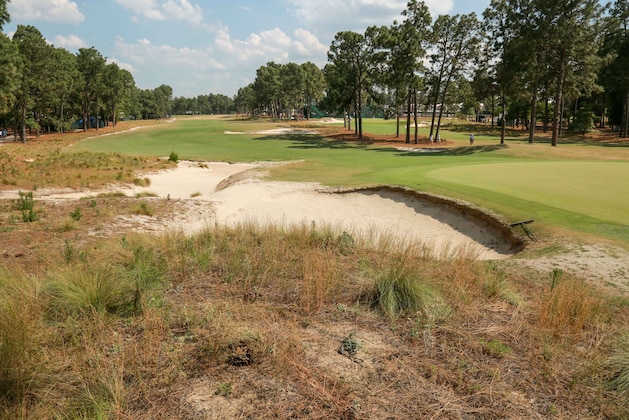Jun 10, 2014; Pinehurst, NC, USA; General view of the 16th hole during a practice round for the U.S. Open golf tournament at Pinehurst No. 2 at Pinehurst Resort & Country Club. Mandatory Credit: Kevin Liles-USA TODAY Sports