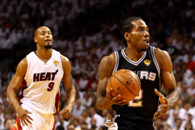 MIAMI, FL - JUNE 10:  Kawhi Leonard #2 of the San Antonio Spurs drives to the basket against the Miami Heat during Game Three of the 2014 NBA Finals at American Airlines Arena on June 10, 2014 in Miami, Florida. NOTE TO USER: User expressly acknowledges and agrees that, by downloading and or using this photograph, User is consenting to the terms and conditions of the Getty Images License Agreement.  (Photo by Andy Lyons/Getty Images)