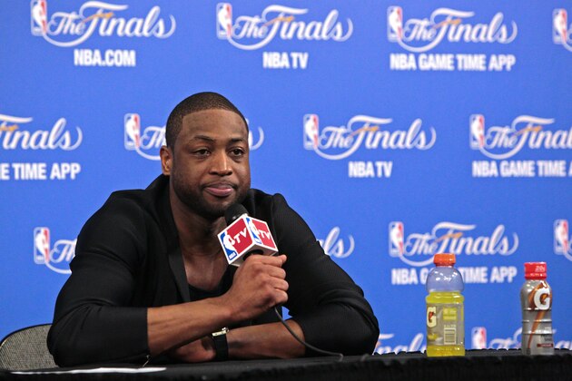 MIAMI, FL - JUNE 10:   Dwyane Wade #3 of the Miami Heat answers questions after Game Three of the 2014 NBA Finals against the San Antonio Spurs at American Airlines Arena on June 10, 2014 in Miami, Florida. NOTE TO USER: User expressly acknowledges and agrees that, by downloading and/or using this photograph, user is consenting to the terms and conditions of the Getty Images License Agreement.  Mandatory Copyright Notice: Copyright 2014 NBAE (Photo by Victor Baldizon/NBAE via Getty Images)