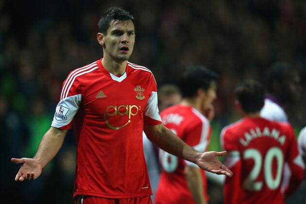 SOUTHAMPTON, ENGLAND - DECEMBER 04:  Dejan Lovren of Southampton protests during the Barclays Premier League match between Southampton and Aston Villa at St Mary's Stadium on December 4, 2013 in Southampton, England.  (Photo by Bryn Lennon/Getty Images)