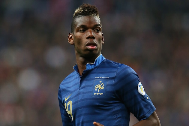 PARIS, FRANCE - OCTOBER 15:  Paul Pogba of France in action during the FIFA 2014 World Cup Qualifying Group I match between France and Finland at the Stade de France on October 15, 2013 in Paris, France.  (Photo by Julian Finney/Getty Images)