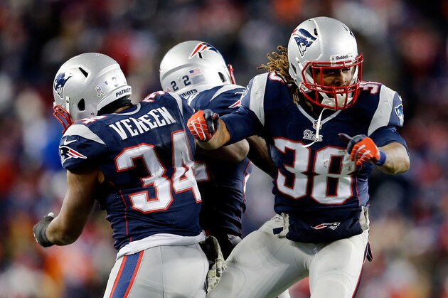 FOXBORO, MA - NOVEMBER 24: Running back Brandon Bolden #38, running back Shane Vereen #34, and running back Stevan Ridley #22 of the New England Patriots celebrate against the Denver Broncos during a game at Gillette Stadium on November 24, 2013 in Foxboro, Massachusetts.  (Photo by Jim Rogash/Getty Images)