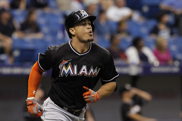 ST. PETERSBURG, FL - JUNE 5:  Giancarlo Stanton #27 of the Miami Marlins rounds the bases after hitting a two-run home run off of pitcher Brad Boxberger #26 of the Tampa Bay Rays during the seventh inning of a game on June 5, 2014 at Tropicana Field in St. Petersburg, Florida.  (Photo by Brian Blanco/Getty Images)