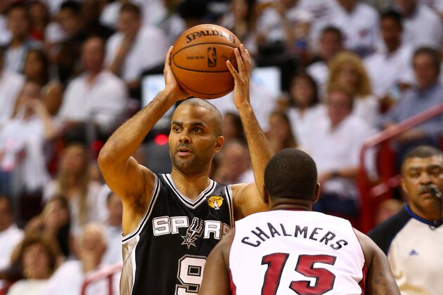 MIAMI, FL - JUNE 10: Tony Parker #9 of the San Antonio Spurs looks to pass as Mario Chalmers #15 of the Miami Heat defends during Game Three of the 2014 NBA Finals at American Airlines Arena on June 10, 2014 in Miami, Florida. NOTE TO USER: User expressly acknowledges and agrees that, by downloading and or using this photograph, User is consenting to the terms and conditions of the Getty Images License Agreement.  (Photo by Andy Lyons/Getty Images)